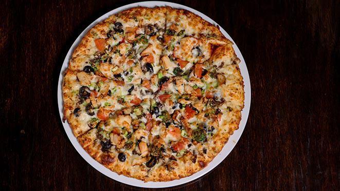Creamy Garlic Chicken · Rich and creamy garlic sauce, chicken breast, mushrooms, black olives, green onions, broccoli and cooked tomatoes.