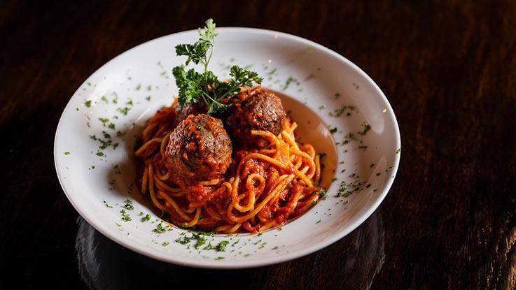 Spaghetti · Spaghetti with tomatoes and roasted garlic in a fresh marinara sauce. Spaghetti with meatballs includes bell peppers, onions, and garlic sautéed in white wine.
