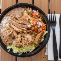 Carnitas Bowl  · Carnitas (pork) rice and beans, salad, pico de gallo and cheese.