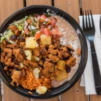 Pastor Bowl  · Pastor pork meat, rice and beans, salad, pico de gallo and cheese.