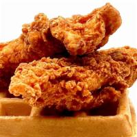 Fried Chicken & Waffles  · Two large fried chicken breast tenders served with a buttermilk waffle and syrup