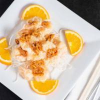 Walnut Shrimp · Fried shrimp marinated in homemade mayo sauce. Served with honey glazed walnuts over fresh l...