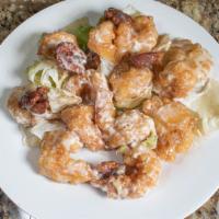 Walnut Shrimp · Served with egg drop soup steamed rice and chicken salad.