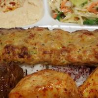 Lula Kabob Combo Plate · One chicken Lula, chicken, and filet mignon shish served on a bed of rice, sides of salad, h...