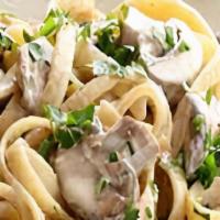 Chicken Mushroom Fettuccini Alfredo · Grilled chicken breast, fettuccine, mushroom, garlic, salt, pepper parmesan cheese, and spic...