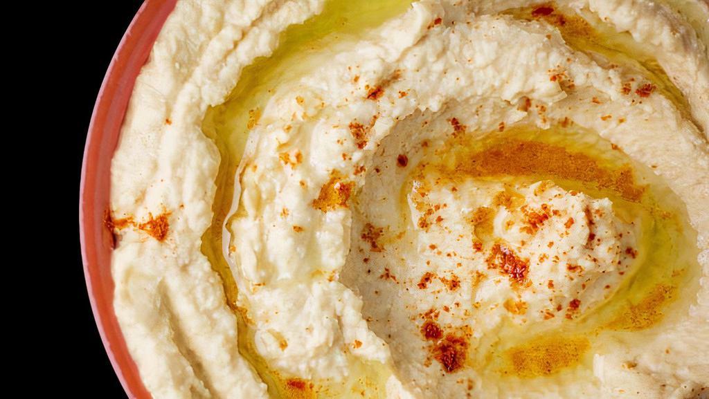 Hummus · Hummus served with pita bread.