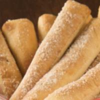 Garlic Bread · Eight sticks with garlic, parmesan, and dipping sauce.