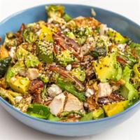 The Salad · Butter lettuce, brussel sprouts, goat cheese, dates, avocado, sesame, grilled chicken with o...