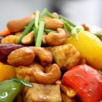 Cashew Nut With Chicken · Chicken, cashew nut, bell pepper, onions, and red curry paste with chili oil served with whi...