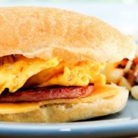 Sausage & Egg Sandwich · Sausage, egg, hash brown patty, cheese, mayonnaise on gourmet bun.