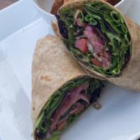 Veggie Wrap · Light, fresh, and full of flavor! Sautéed baby bella mushrooms, avocado, pickled red onions,...
