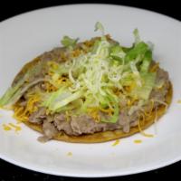 Beans Tostada · Lettuce and cheese.