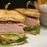 Renaissance Club Sandwich · Applewood smoked bacon, roasted turkey, avocado mash, romaine lettuce, heirloom tomatoes, bu...