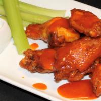 Citrus Hot Wings · Buffalo-style with celery, carrots, blue cheese dressing.