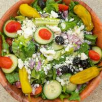 Greek Salad · Lettuce, tomato, onion, cucumber, Greek olives, pepperoncini, and feta cheese.