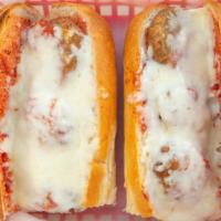 Meatball Sandwich · Meatball marinated in marinara sauce and topped with mozzarella cheese.