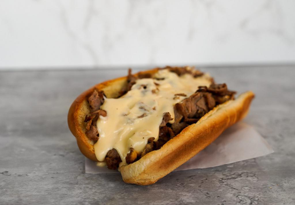 Classic Philly Cheesesteak · Classic 8” Philly cheesesteak loaded with grilled steak and melted cheese on a toasted hoagie roll