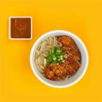 Crispy Chicken Katsu Bowl · panko breaded chicken cutlet + rice // topped with caramelized onions, scallions, sesame see...