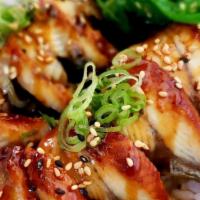 Unagi Bowl · Baked eel, seaweed salad, green onion, sesame seeds, unagi sauce.