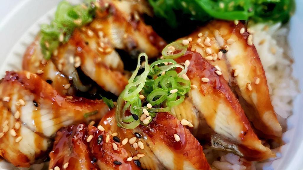 Unagi Bowl · Baked eel, seaweed salad, green onion, sesame seeds, unagi sauce.