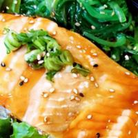 Salmon Bowl · Baked salmon, seaweed salad, green onion, sesame seeds, teriyaki sauce.