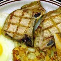 Pork Chops & Eggs · Golden hash browns, toast, two eggs and house marinated pork chops.