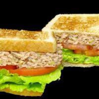 Tuna Sandwich · Homemade tuna with mayonnaise, lettuce, tomato on white toast.