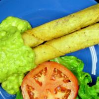 Homemade Taquitos · Two homemade large taquitos with shredded beef.