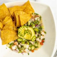 Shrimp Ceviche · Shrimp, lime juice, red onion, cucumber, tomato, avocado, cilantro, garnished with serrano s...