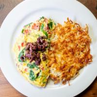 Mediterranean Omelet · Feta, kalamata olives, onions, tomatoes and spinach.