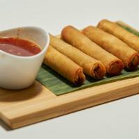Lumpia Shanghai · Ground beef and ground pork seasoned then hand-rolled in our crispy lumpia wrapper.