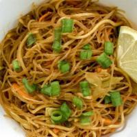 Pancit · Rice noodles simmered in our citrus vegetable broth, mixed with cabbage, carrots, green onio...
