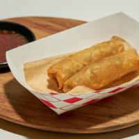 Vegetable Lumpia · Cabbage, carrots, corn and peas, hand-rolled in our crispy lumpia wrapper.