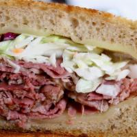 The Sycamore Melt · Our famous pastrami, swiss cheese, cole slaw and our homemade thousand island dressing on gr...