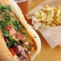 La Street Dog · One-forth pound all-beef hot dog wrapped in hickory smoked bacon and topped with sautéed pep...