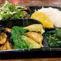 Vegetarian Bento · Sauteed shishito, eggplant miso, and vegetable gyoza. 
Side of spinach with sesame sauce, ki...