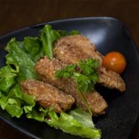 Fried Chicken (Jidori)Wings · Juicy chicken wings with crispy layer doused in our house blended sweet and spicy sauce.