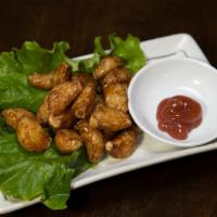 Fried Garlic With Plum Paste (Vegetarian) · Deep fried garlic with a sourly plum paste.