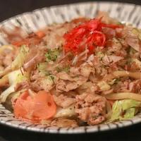 Yakiudon · Stir-fried udon noodle with pork, carrot, nira (garlic chive), cabbage, andonion topped with...