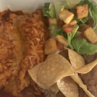 Enchiladas · 2 beef or chicken enchiladas, rice and beans.