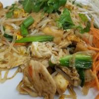 Pad Thai · Thin rice noodles, egg, bean sprouts, green onion, tamarind, peanut, lime, sweet and sour sa...