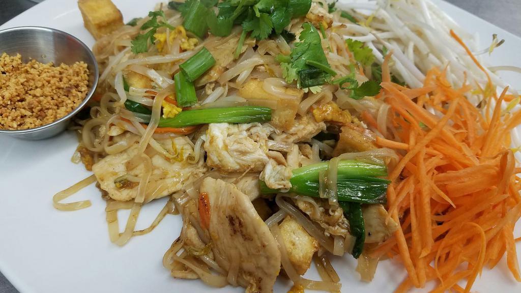 Pad Thai · Thin rice noodles, egg, bean sprouts, green onion, tamarind, peanut, lime, sweet and sour sauce.