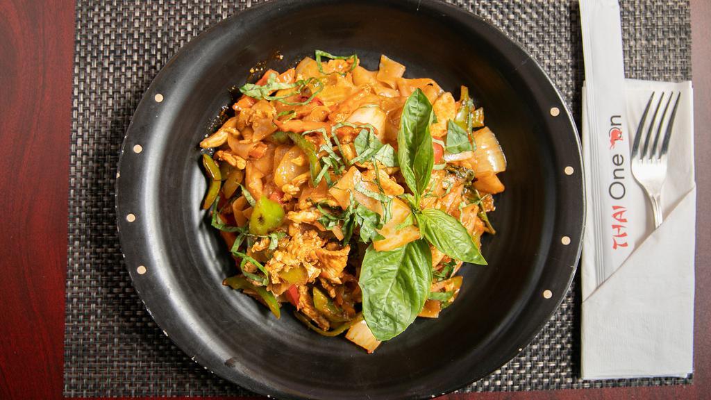 Drunken Spicy Noodles · Wide noodles, chili, bell pepper, onion, carrot, egg, Thai basil and brown sauce.