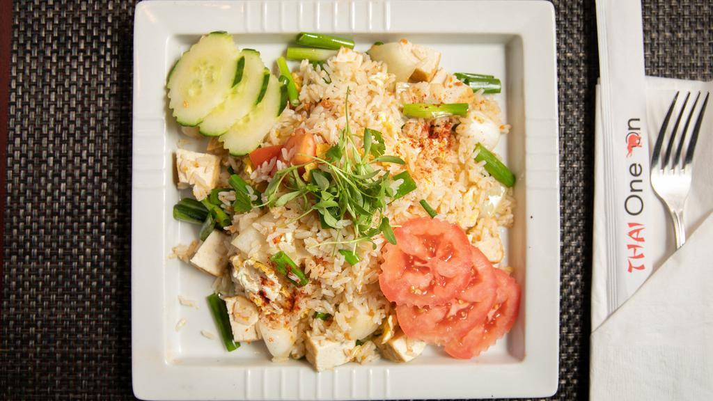 Thai Fried Rice · Jasmine rice, onion, green onion, egg, tomato and cucumber.