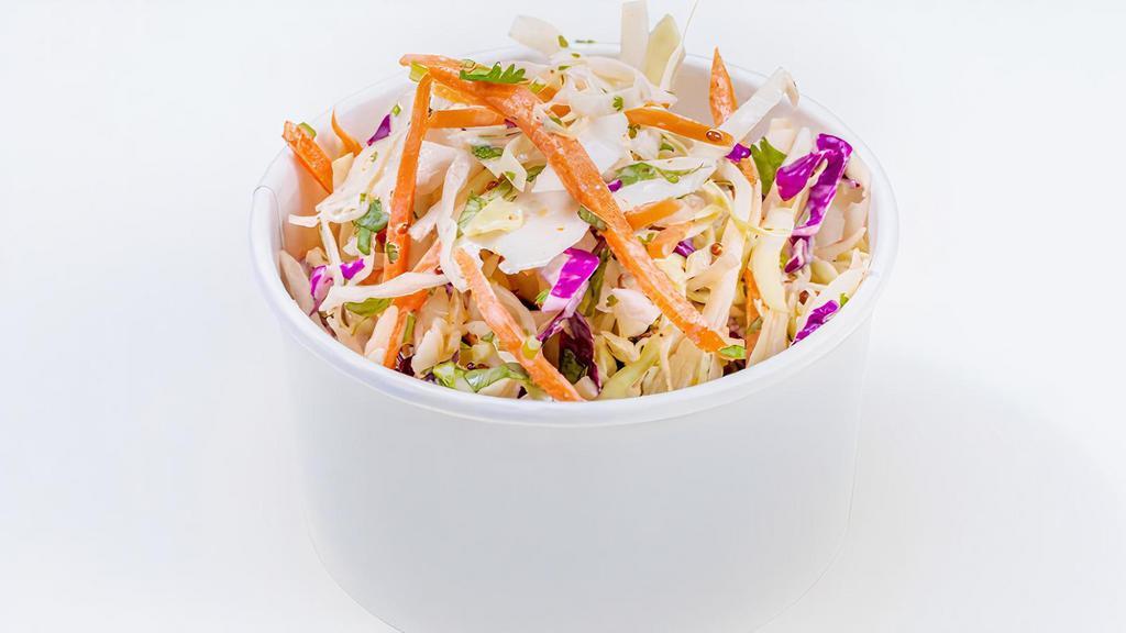 Coleslaw · Hand-cut slaw with fresh cilantro and whole grain mustard and cider dressing.