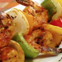 Shrimp Shish Kabob · Marinated shrimp skewered with bell peppers & onions.