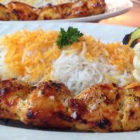 Garlic Saffron Chicken Kabob · Our marinated chicken breast grilled over open flames drizzled with our lemon garlic sauce.