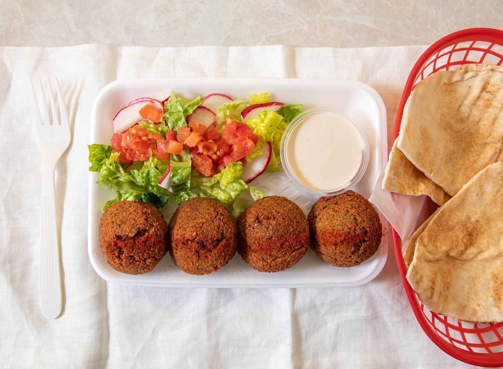 Falafel · A seasoned mixture of crushed garbanzo beans, fava beans, onions, garlic, and parsley.