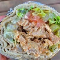 Chicken Shawarma · Marinated chicken breast with lettuce, tomatoes, pickles, and garlic spread, wrapped in a pi...