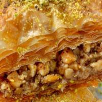 Baklava · 2 pieces of our house made baklava, made with walnuts, topped with simple syrup, infused wit...
